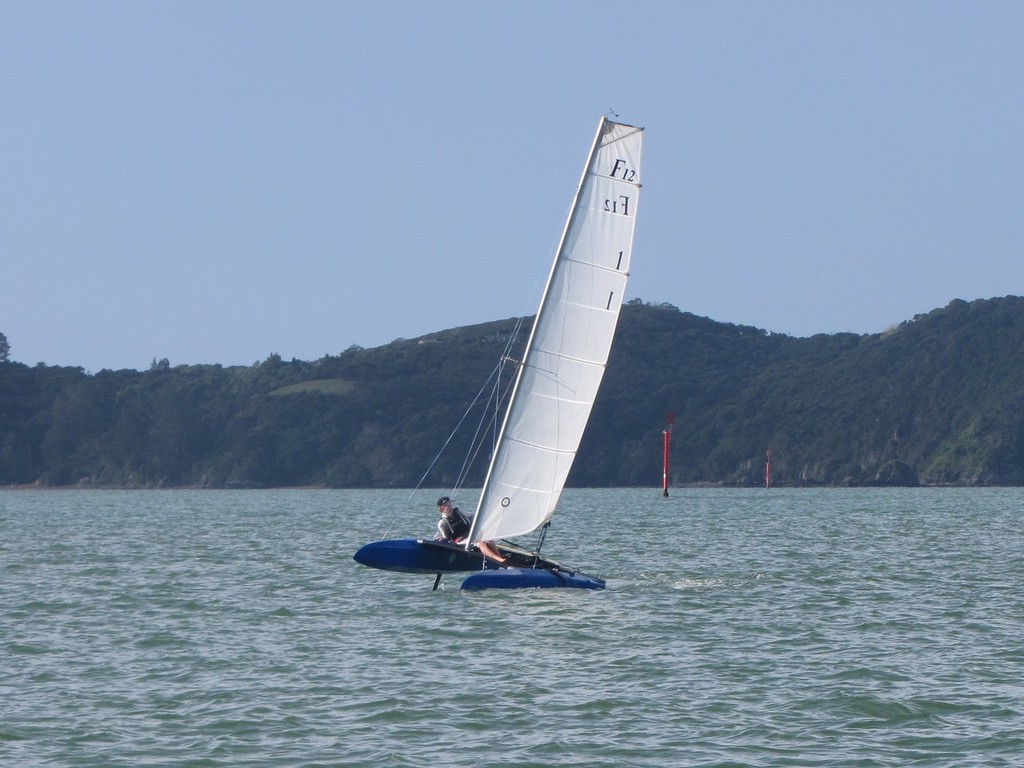 Nathaniel enjoys flying a hull - Junior Training for the Americas Cup © Neil Deverell